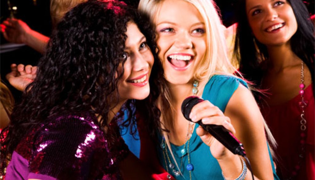 Girls with microphone singing in it